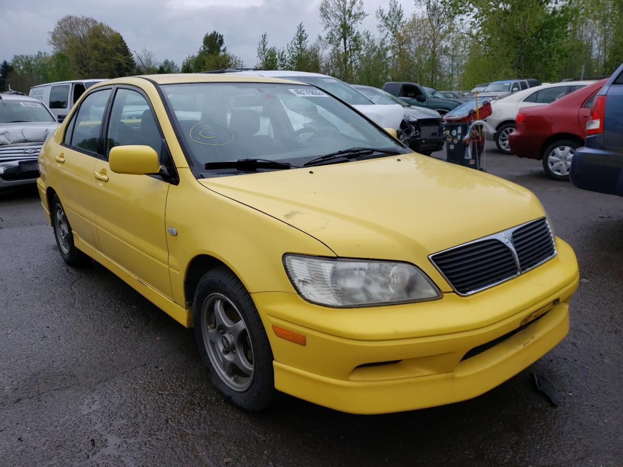 MITSUBISHI LANCER OZ 2002 with VIN JA3AJ86E22U040237 - Photo from auction
