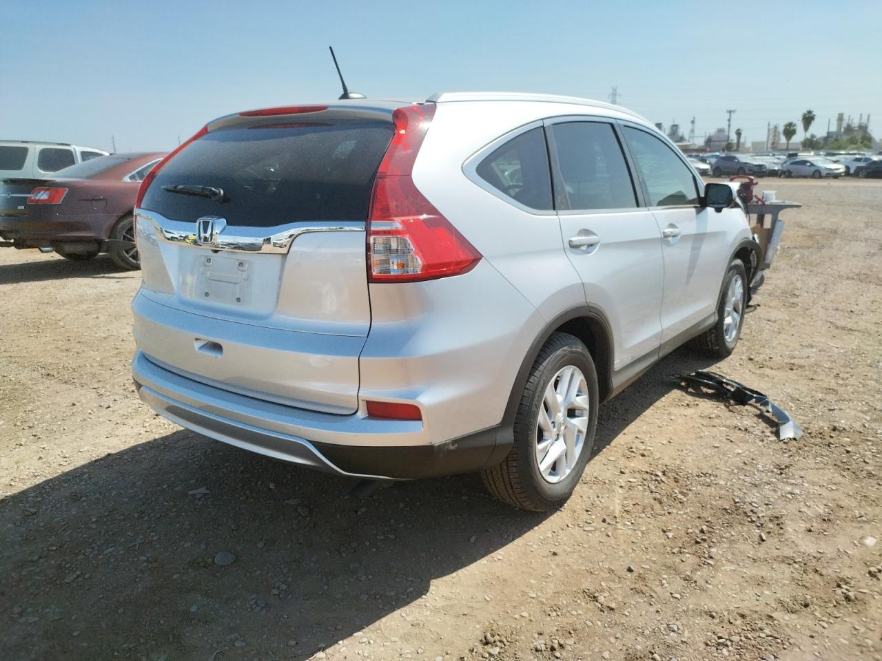 Photo 4 from auction – 2016 HONDA CR-V EXL with VIN 2HKRM3H75GH532517