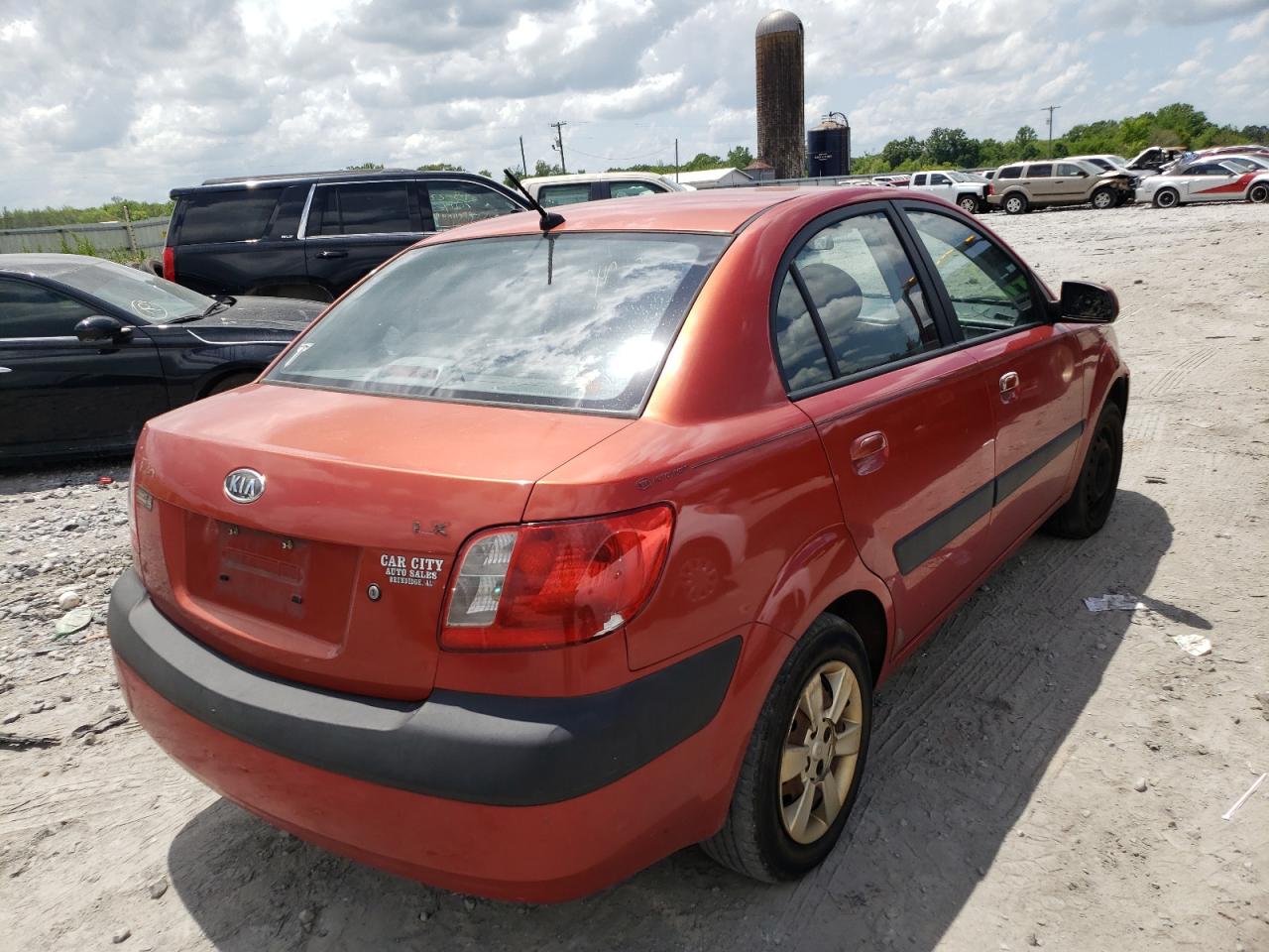 Photo 4 from auction – 2007 KIA RIO BASE with VIN KNADE123076212725