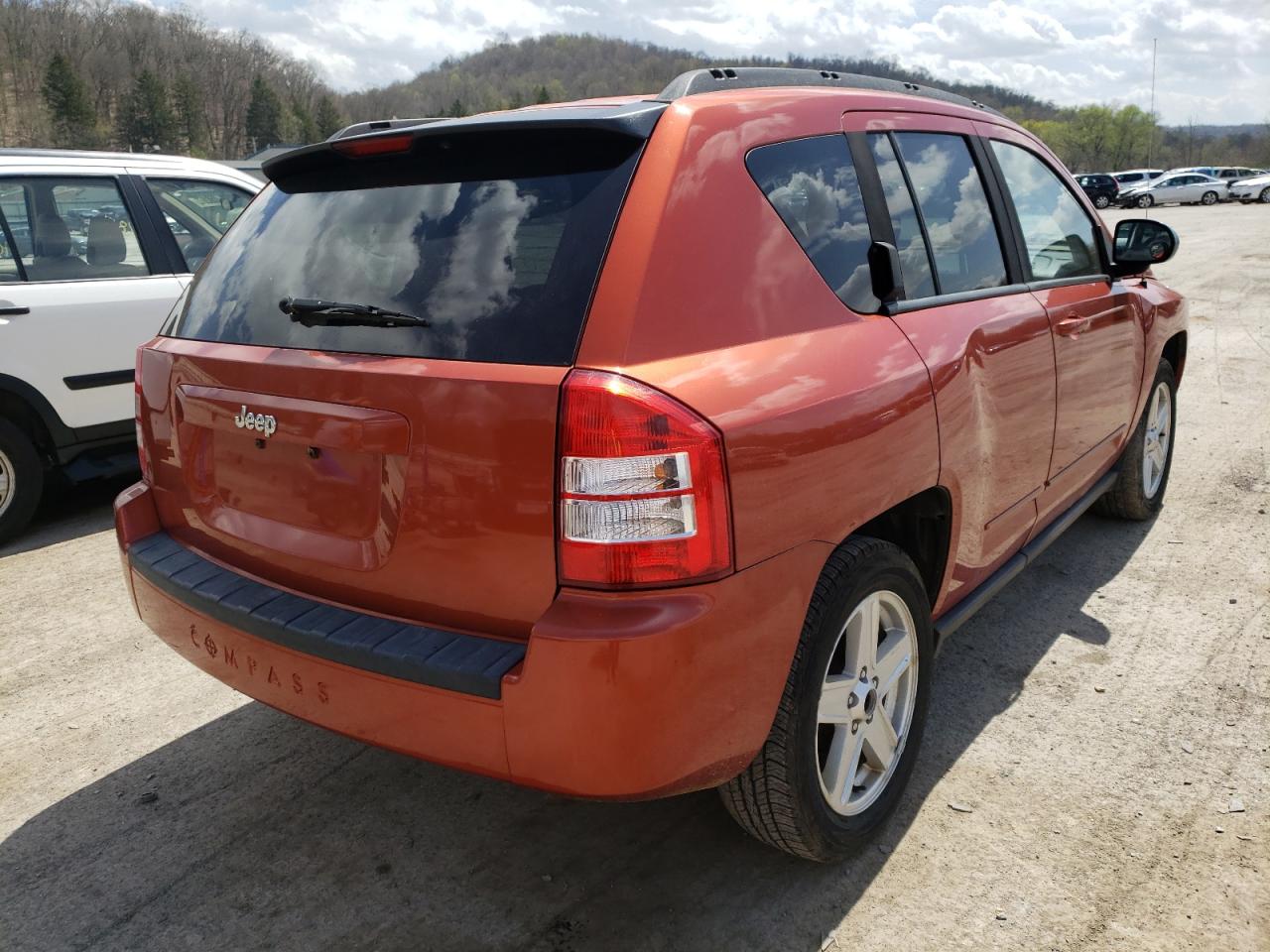 Photo 4 from auction – 2010 JEEP COMPASS SP with VIN 1J4NT4FB6AD504182