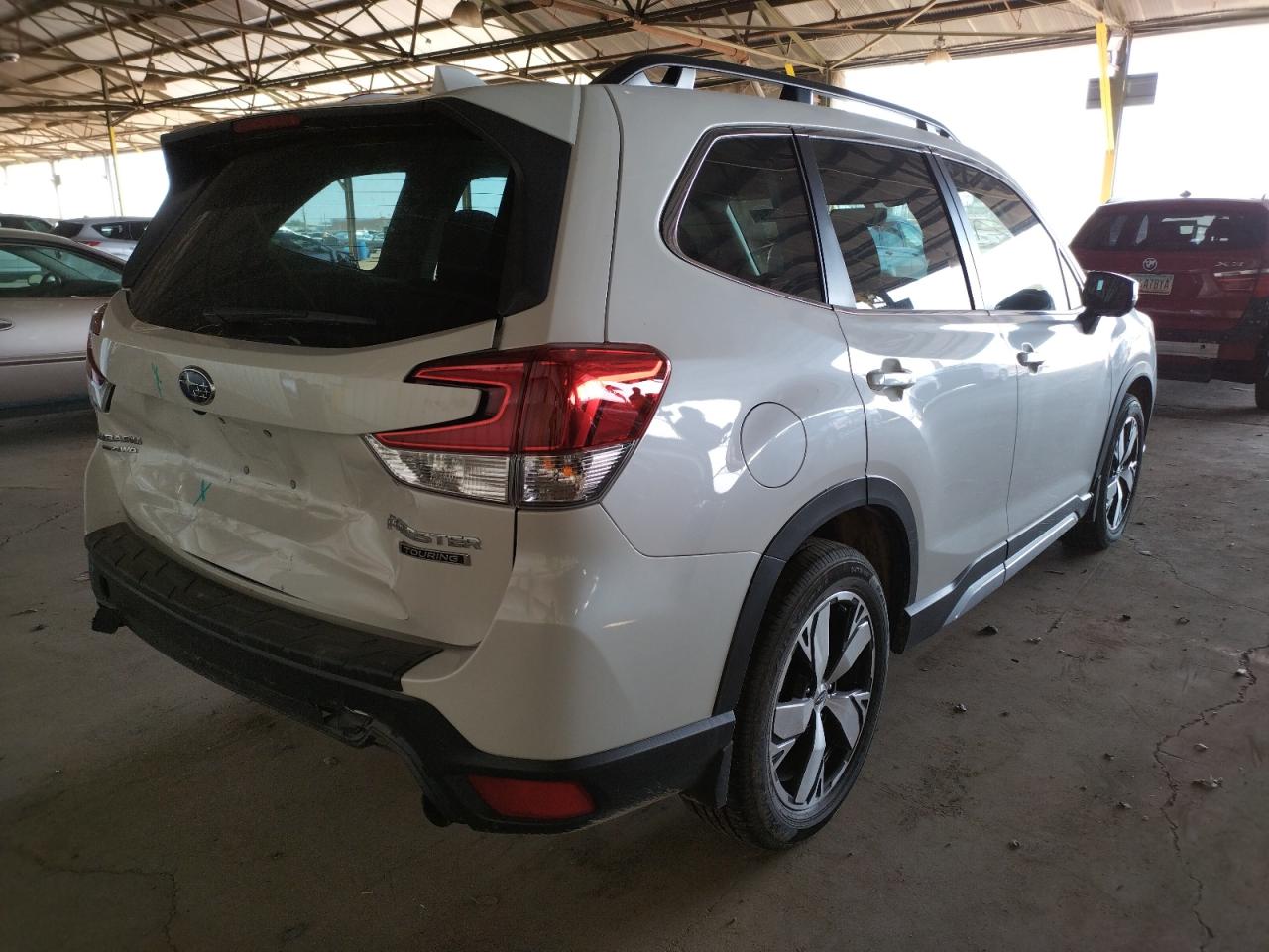 Photo 4 from auction – 2021 SUBARU FORESTER T with VIN JF2SKAXC0MH501939
