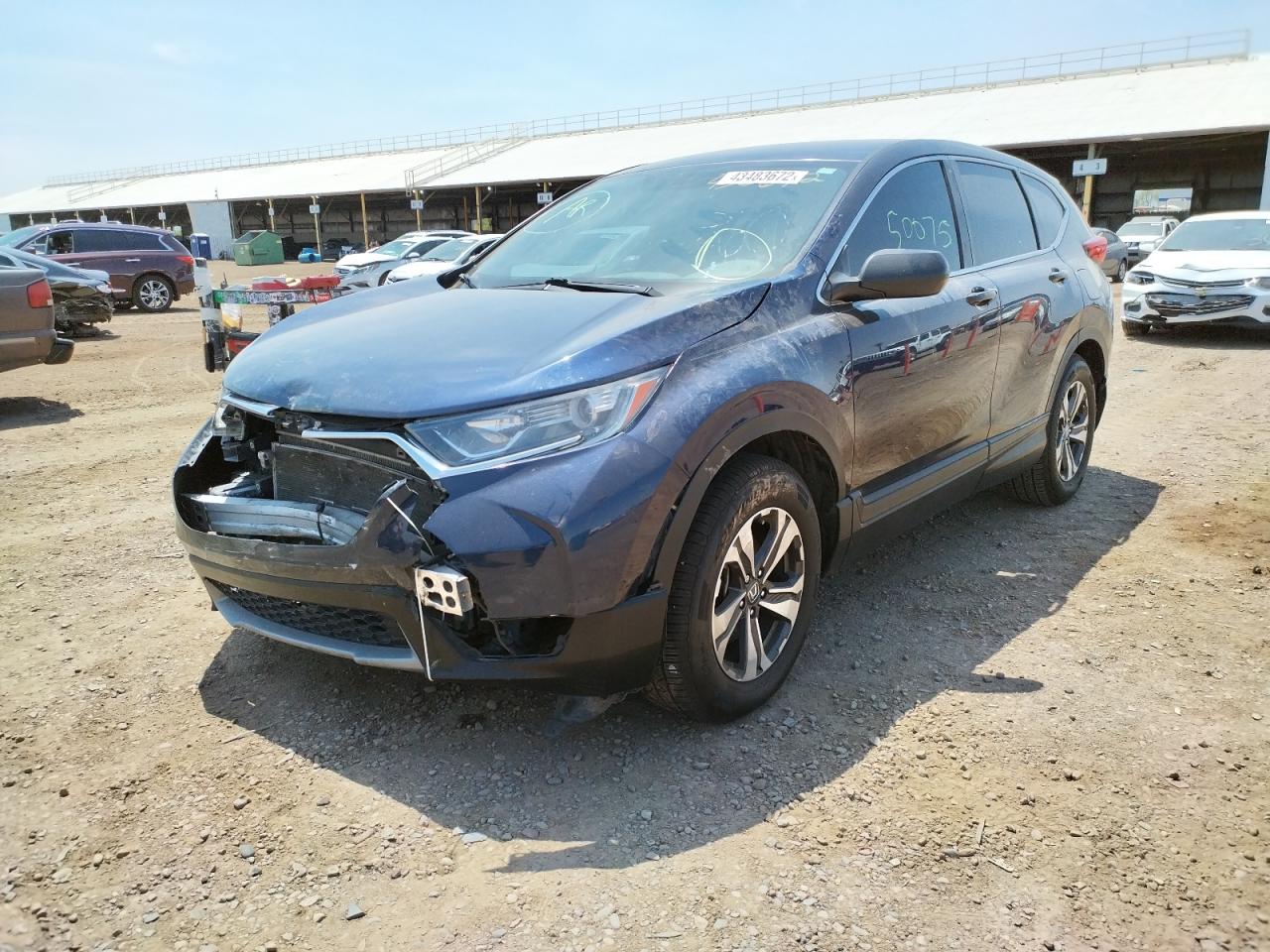 Photo 2 from auction – 2017 HONDA CR-V LX with VIN 7FARW5H35HE006833