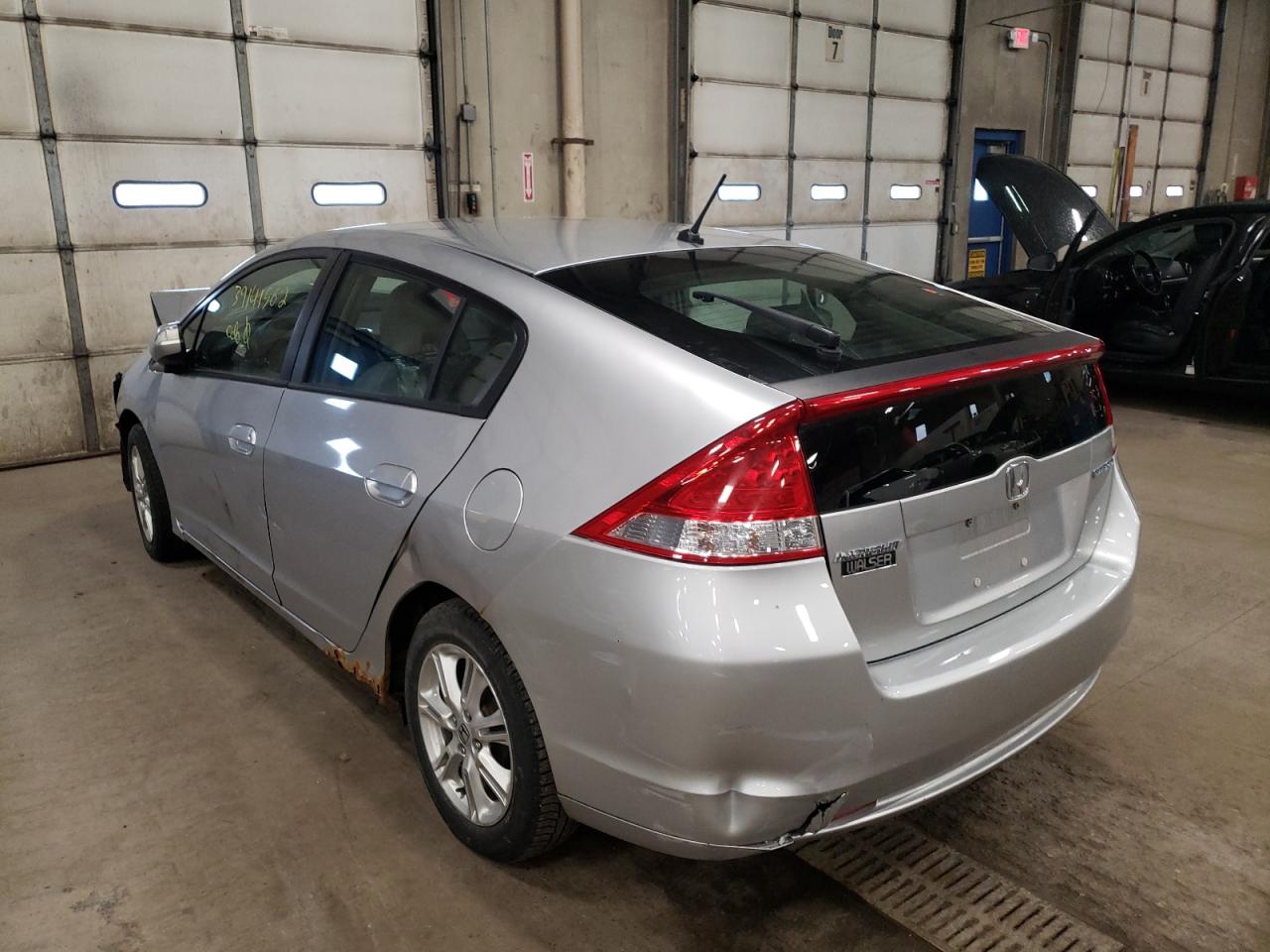 Photo 3 from auction – 2010 HONDA INSIGHT EX with VIN JHMZE2H70AS005063