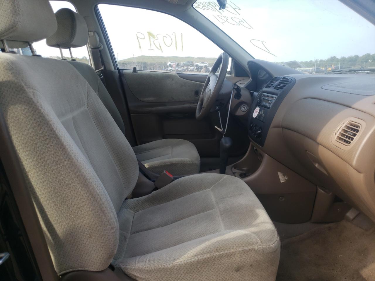 Photo 5 from auction – 1999 MAZDA PROTEGE DX with VIN JM1BJ2227X0152321