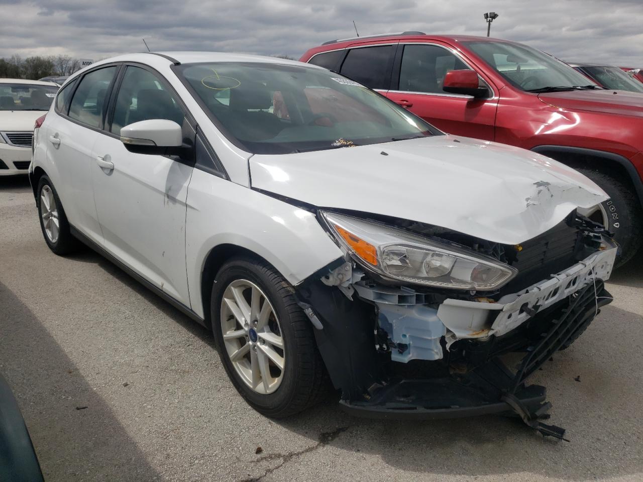FORD FOCUS SE 2017 with VIN 1FADP3K27HL313303 - Photo from auction