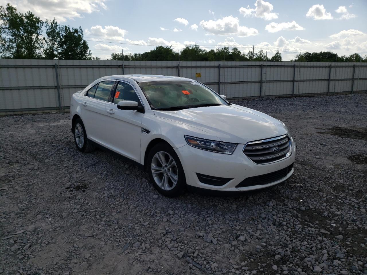 FORD TAURUS SEL 2016 with VIN 1FAHP2E82GG131494 - Photo from auction