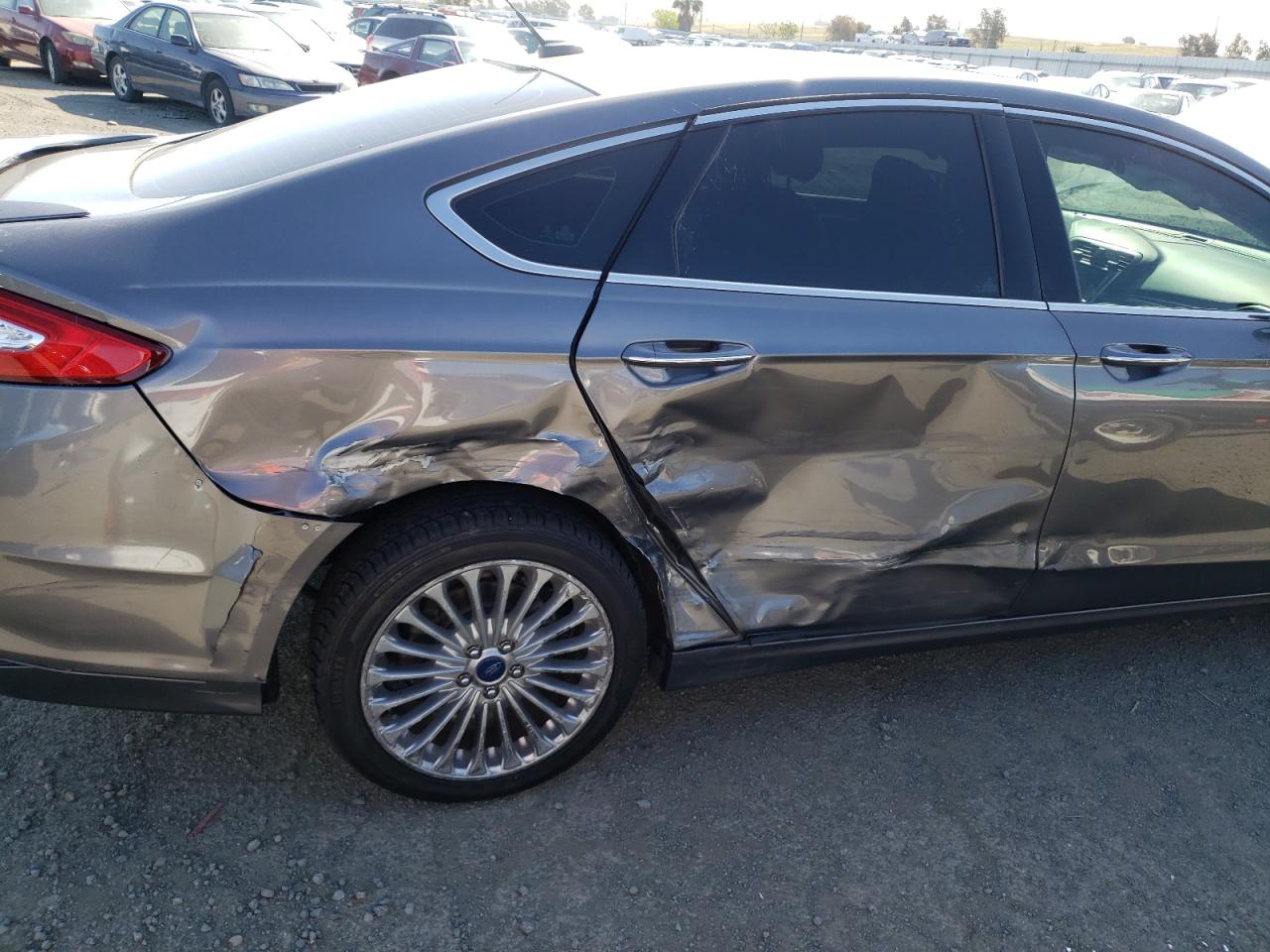 Photo 9 from auction – 2014 FORD FUSION TIT with VIN 3FA6P0RU2ER366390