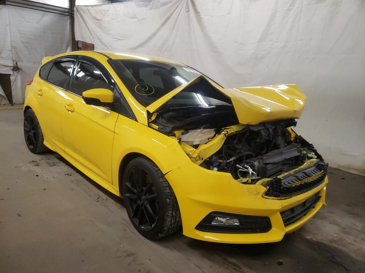 FORD FOCUS ST 2017 with VIN 1FADP3L96HL228951 - Photo from auction