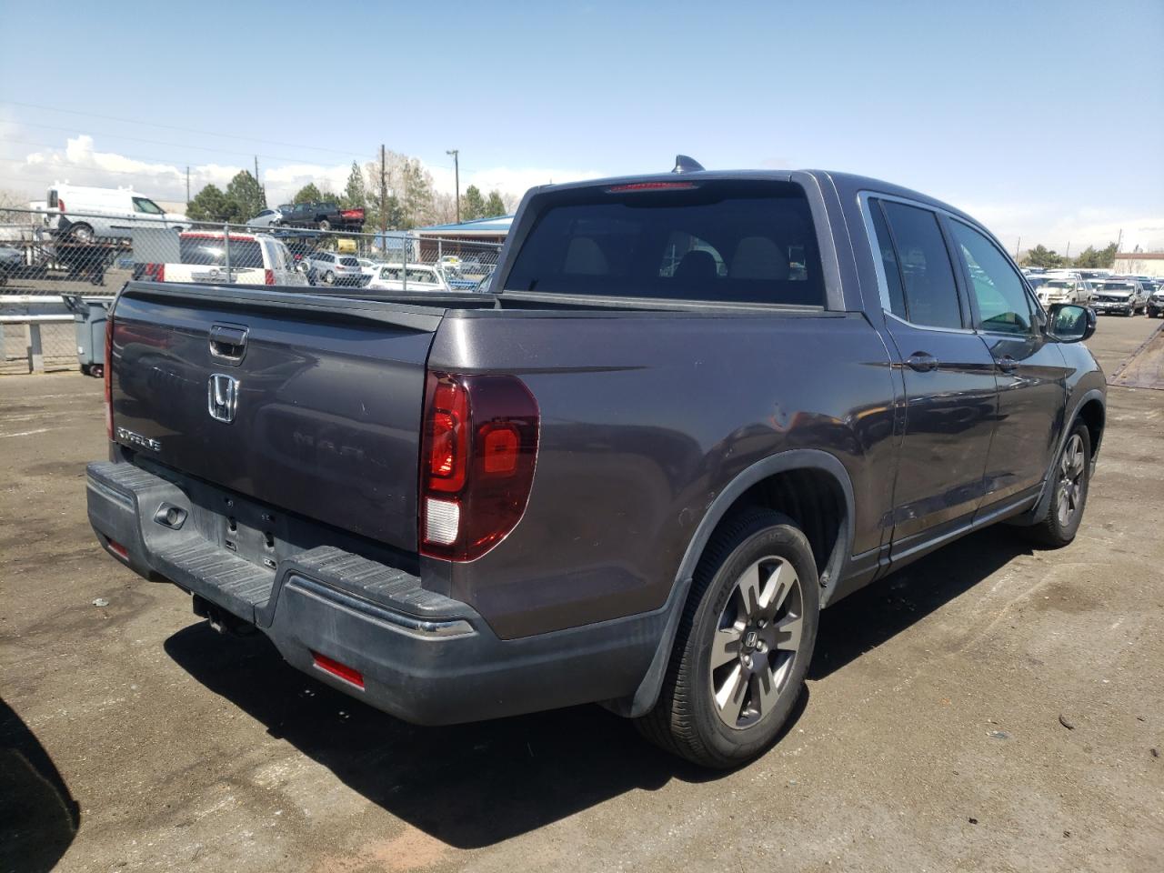 Photo 4 from auction – 2017 HONDA RIDGELINE with VIN 5FPYK2F51HB006924