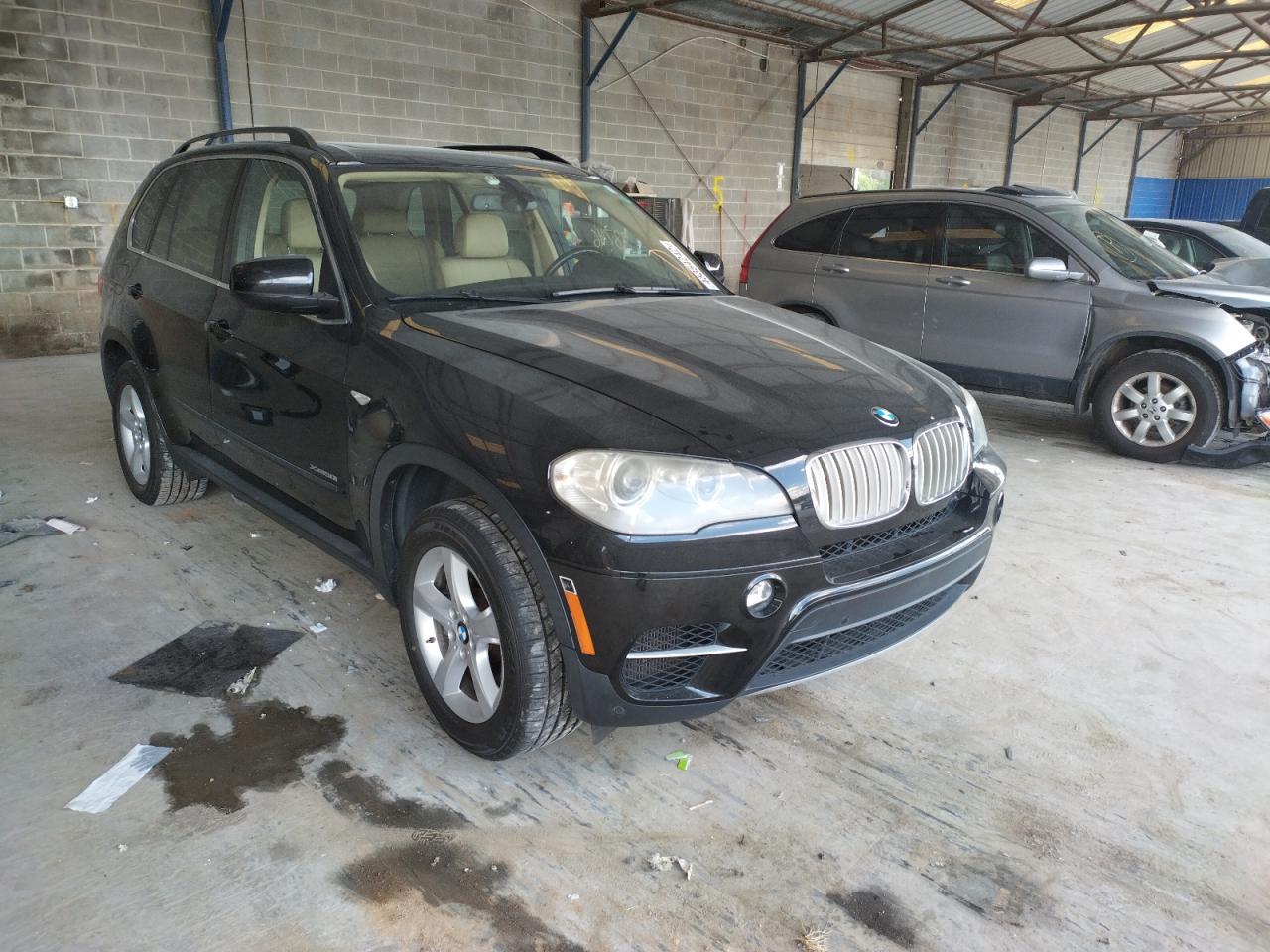 BMW X5 XDRIVE5 2012 with VIN 5UXZV8C58CL423800 - Photo from auction