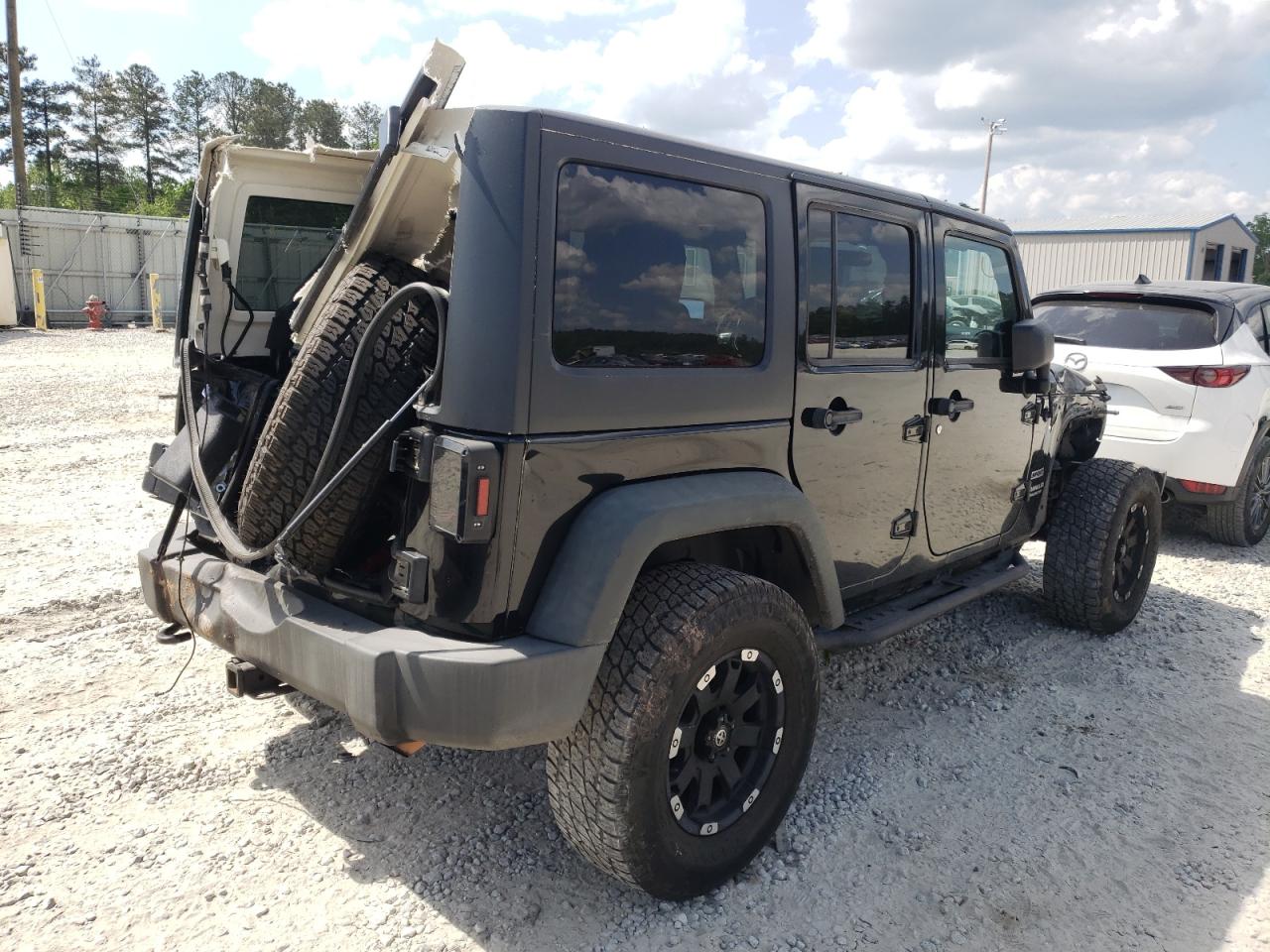Photo 4 from auction – 2011 JEEP WRANGLER U with VIN 1J4BA3H18BL597088