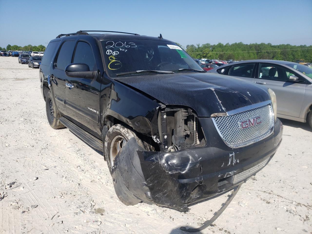 GMC YUKON 2007 with VIN 1GKFC13097R332063 - Photo from auction