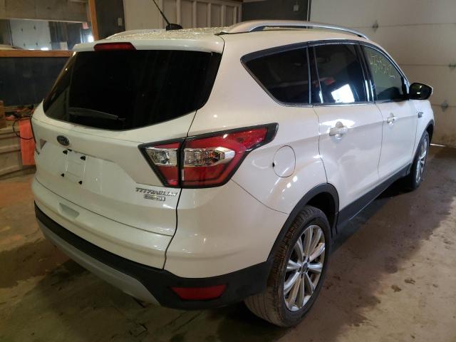 Photo 4 from auction – 2017 FORD ESCAPE TIT with VIN 1FMCU0J97HUA09809