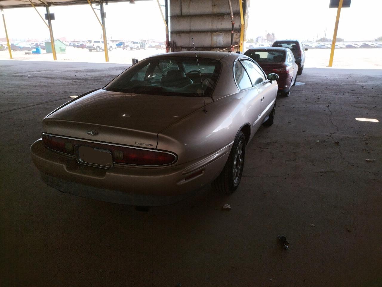 Photo 4 from auction – 1998 BUICK RIVIERA with VIN 1G4GD2210W4710467