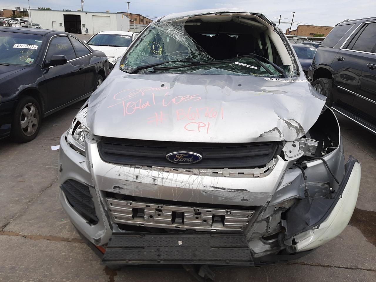 Photo 9 from auction – 2014 FORD ESCAPE S with VIN 1FMCU0F74EUB61761