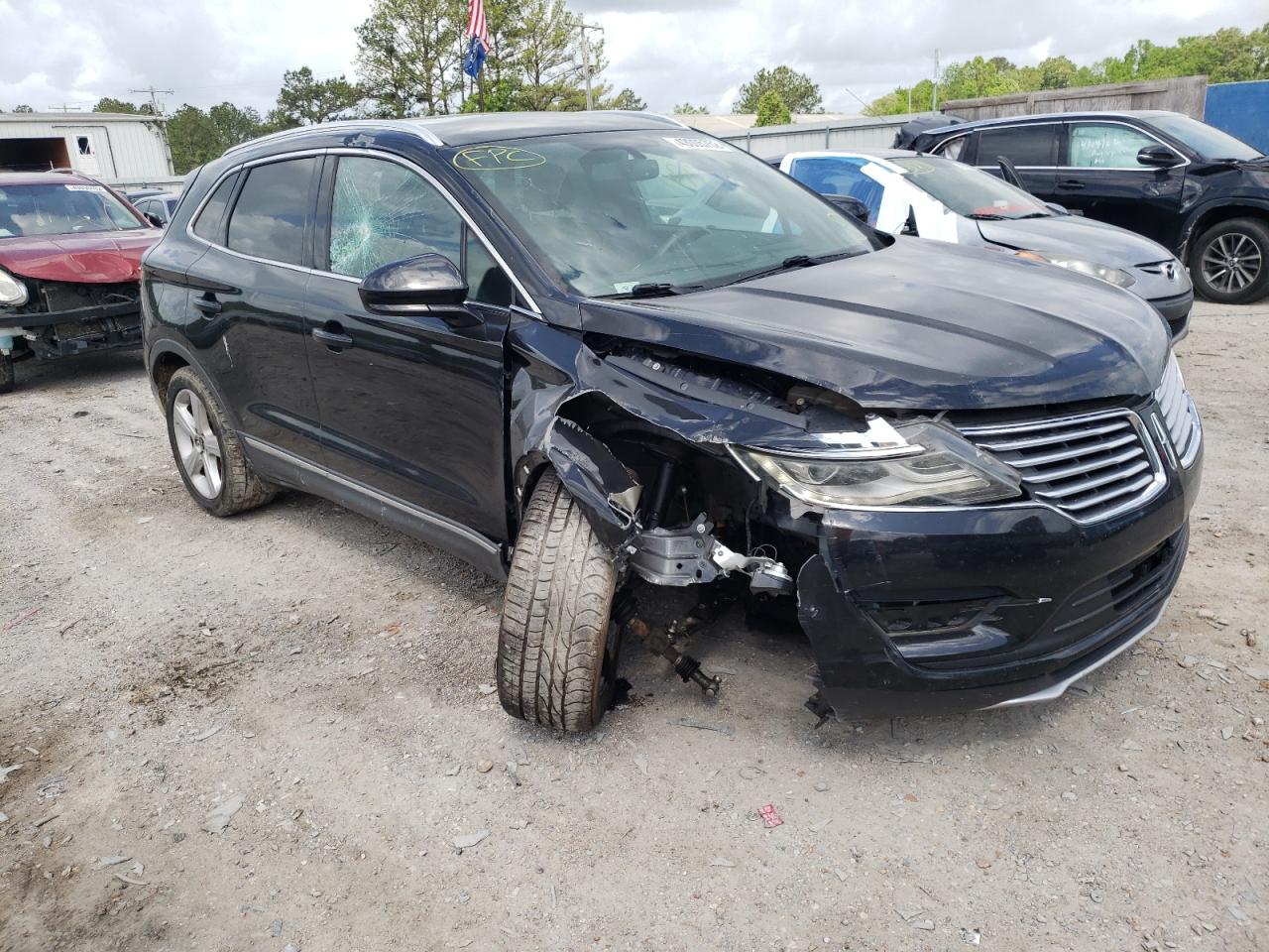 LINCOLN MKC 2015 with VIN 5LMCJ2A94FUJ10157 - Photo from auction