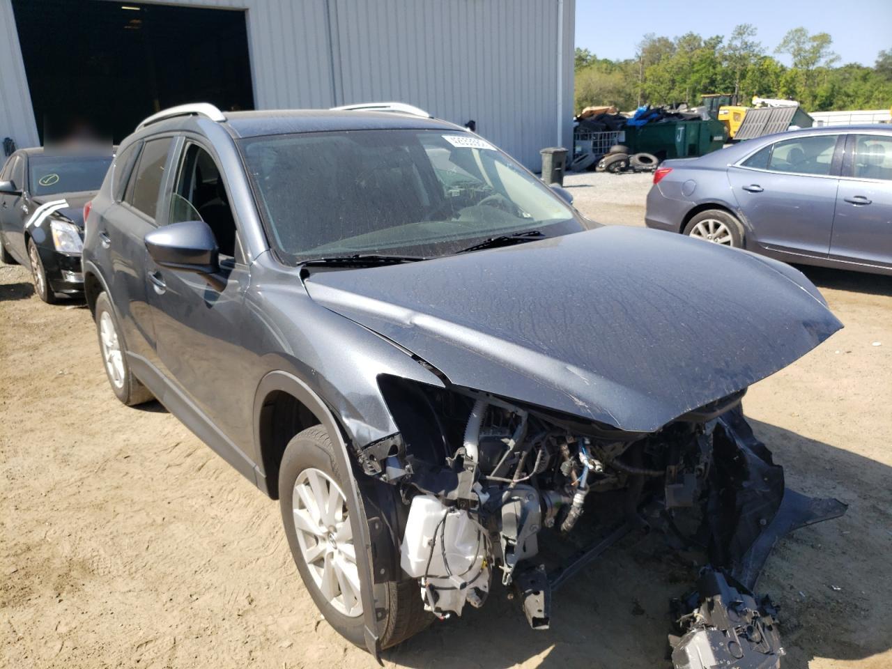 MAZDA CX-5 TOURI 2013 with VIN JM3KE2CE7D0140024 - Photo from auction