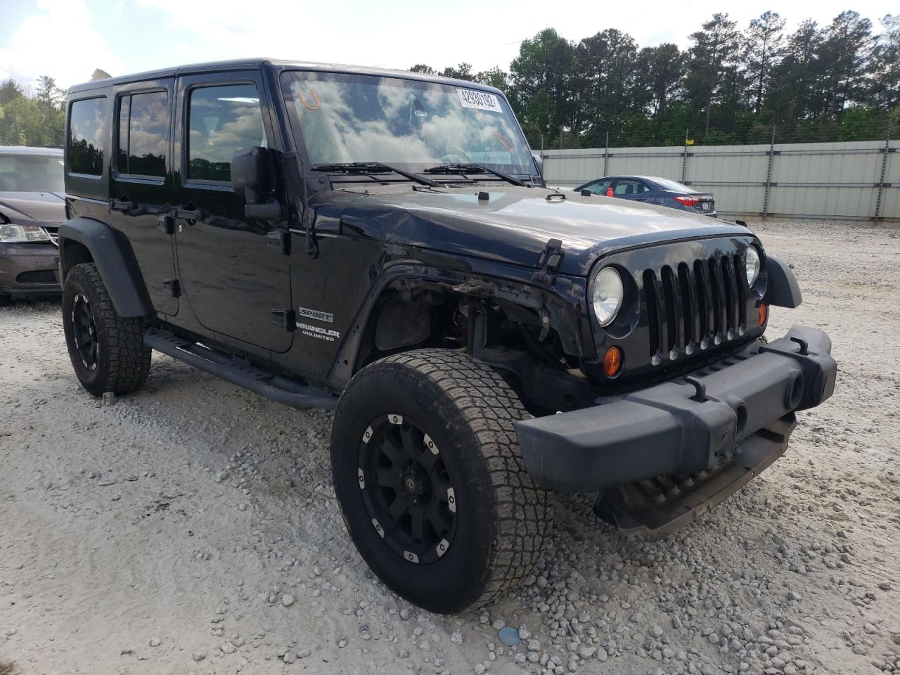 JEEP WRANGLER U 2011 with VIN 1J4BA3H18BL597088 - Photo from auction