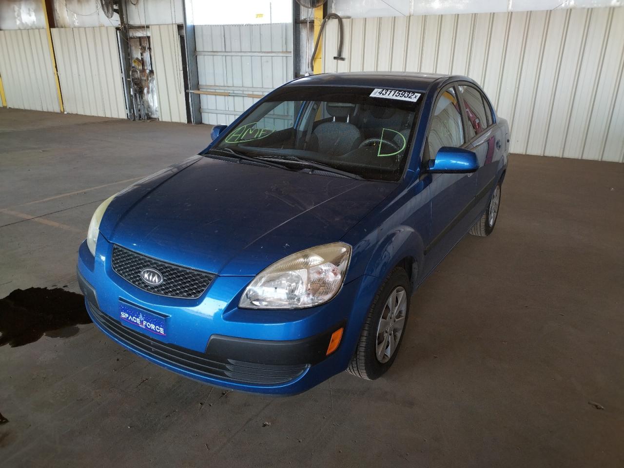 Photo 2 from auction – 2009 KIA RIO BASE with VIN KNADE223X96537214