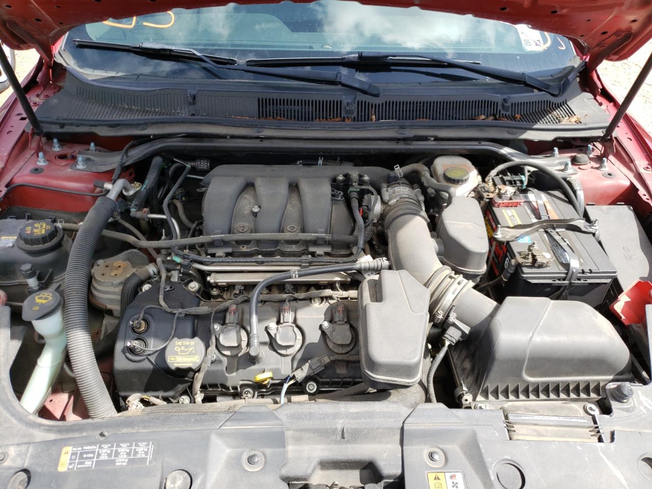 Photo 7 from auction – 2013 FORD TAURUS SEL with VIN 1FAHP2E87DG114377