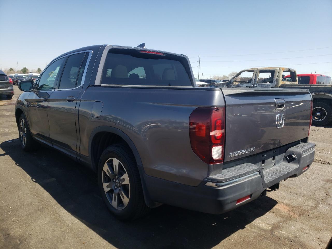 Photo 3 from auction – 2017 HONDA RIDGELINE with VIN 5FPYK2F51HB006924
