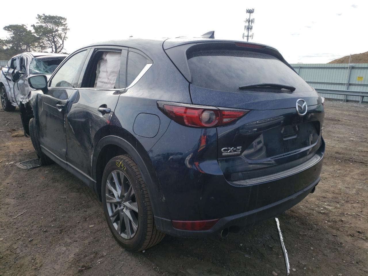 Photo 3 from auction – 2021 MAZDA CX-5 SIGNA with VIN JM3KFBEY1M0471136