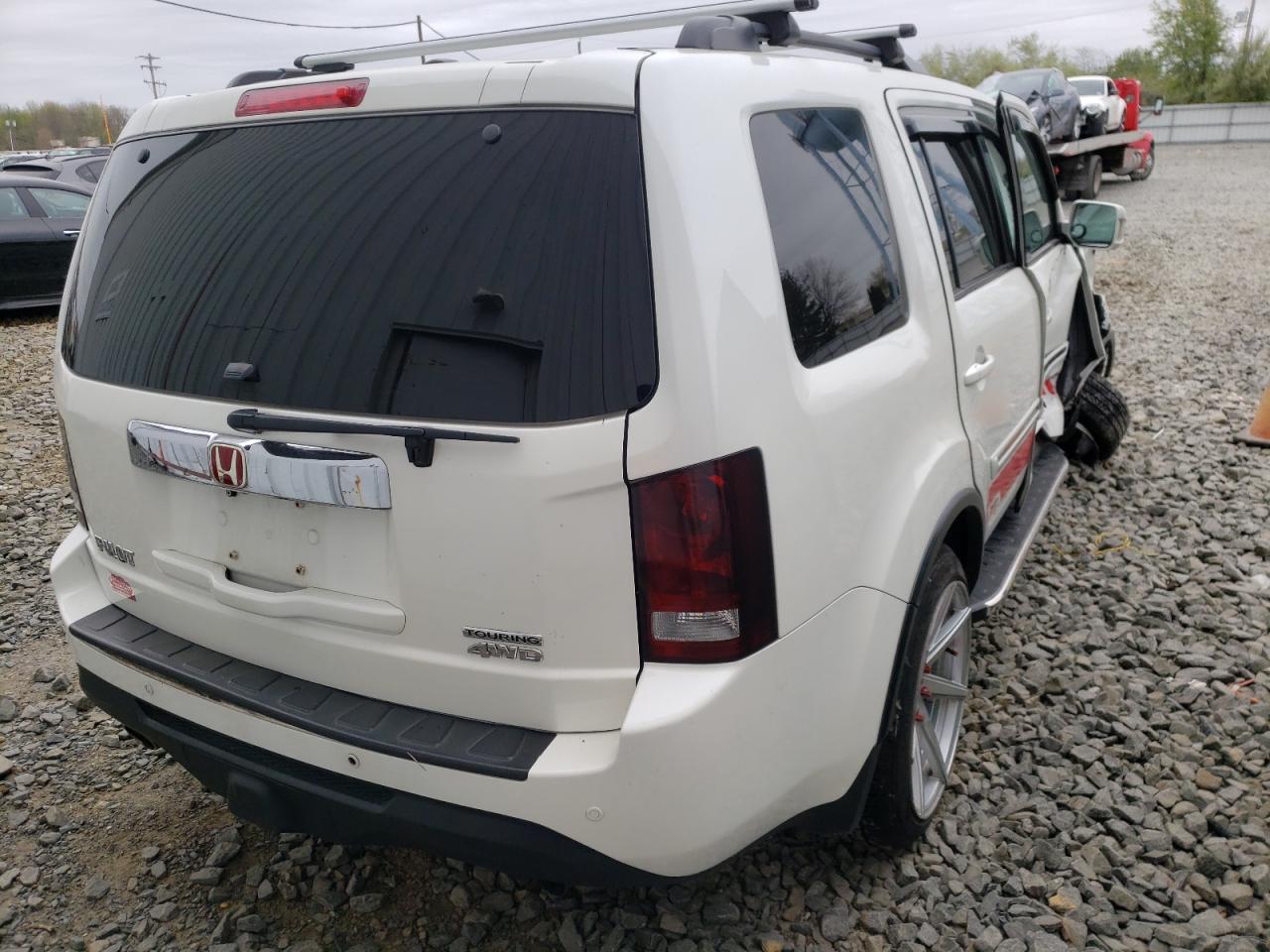 Photo 4 from auction – 2012 HONDA PILOT TOUR with VIN 5FNYF4H9XCB051958