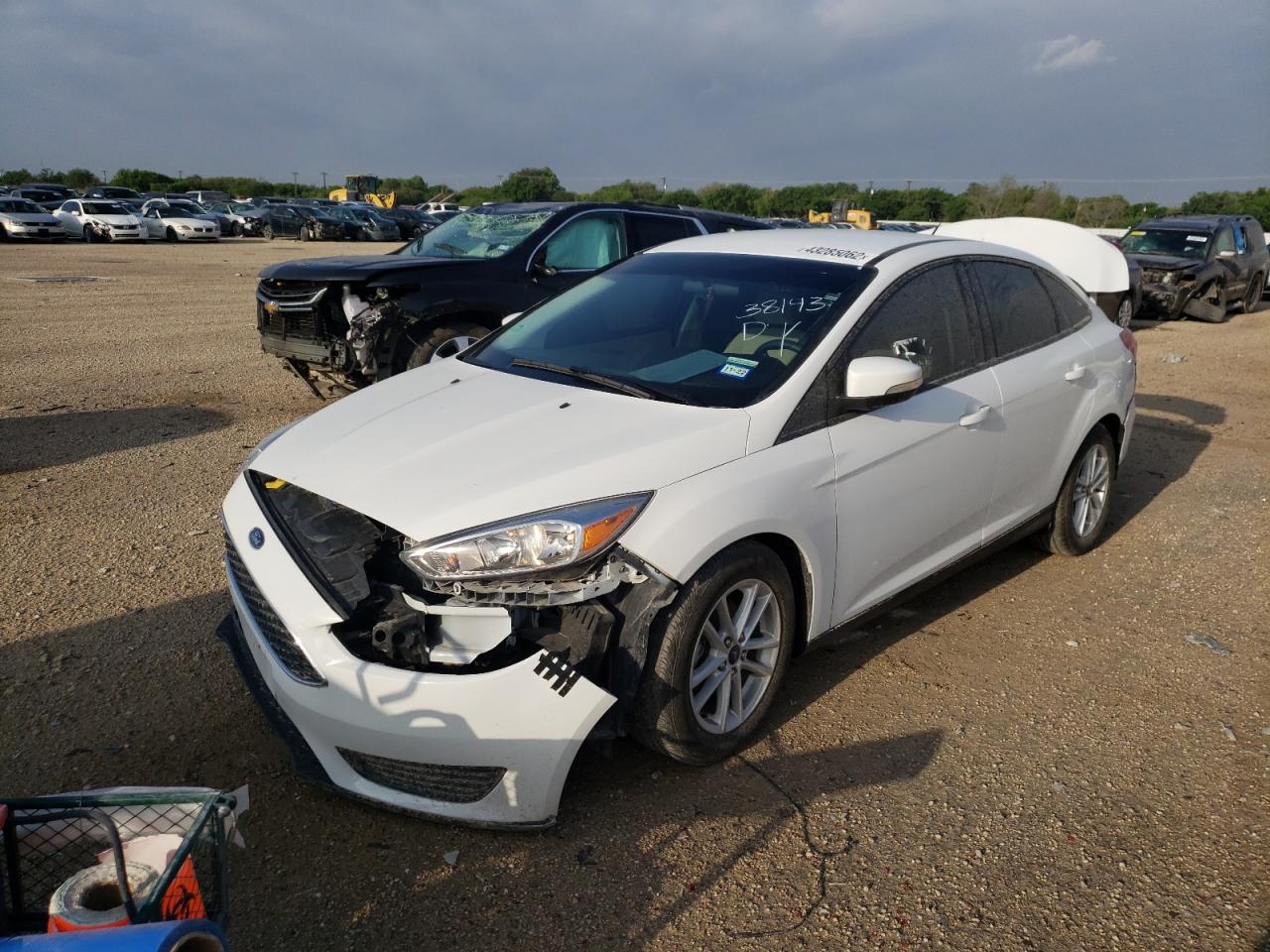 Photo 2 from auction – 2017 FORD FOCUS SE with VIN 1FADP3F21HL319902