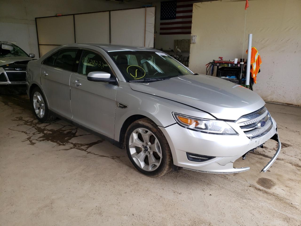 FORD TAURUS SEL 2011 with VIN 1FAHP2EW6BG175604 - Photo from auction