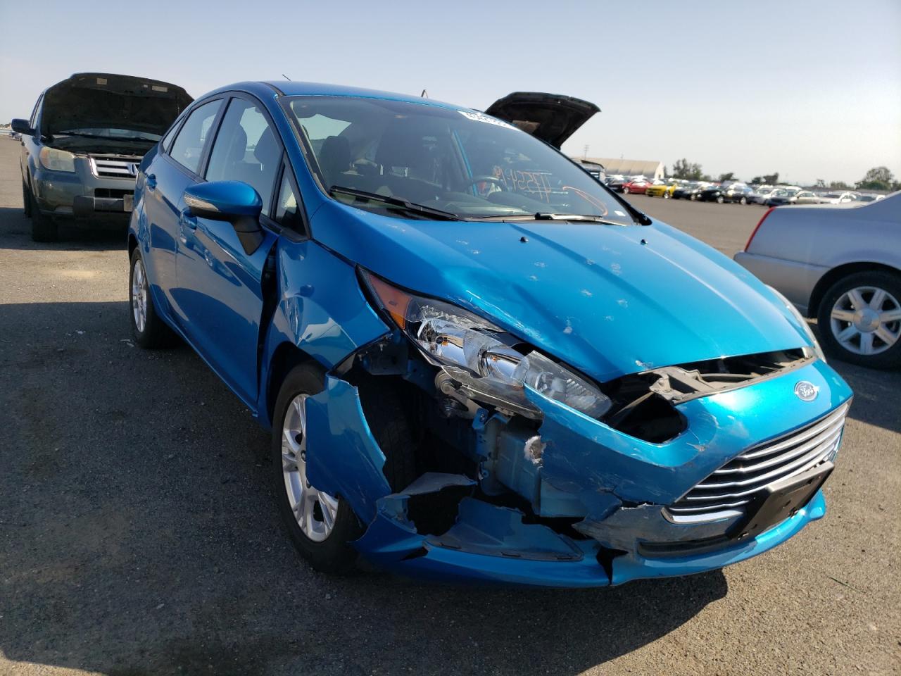 FORD FIESTA SE 2014 with VIN 3FADP4BJ4EM151668 - Photo from auction
