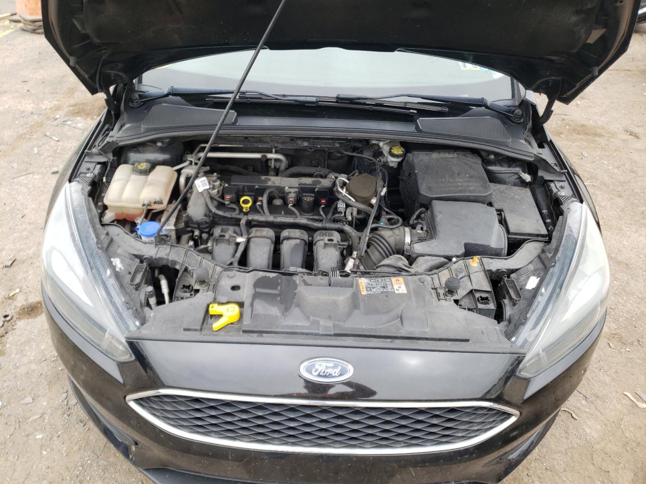 Photo 7 from auction – 2015 FORD FOCUS SE with VIN 1FADP3F21FL234281