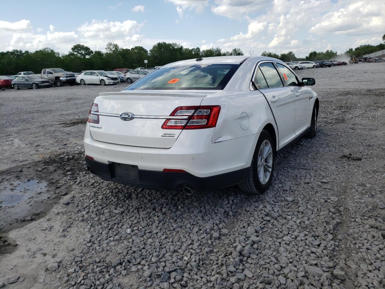 Photo 4 from auction – 2016 FORD TAURUS SEL with VIN 1FAHP2E82GG131494