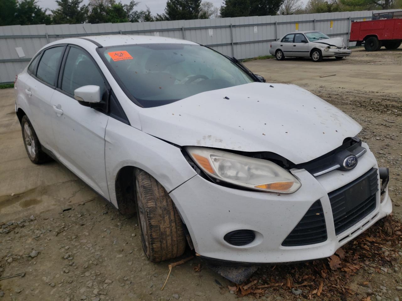 FORD FOCUS SE 2014 with VIN 1FADP3F23EL213690 - Photo from auction