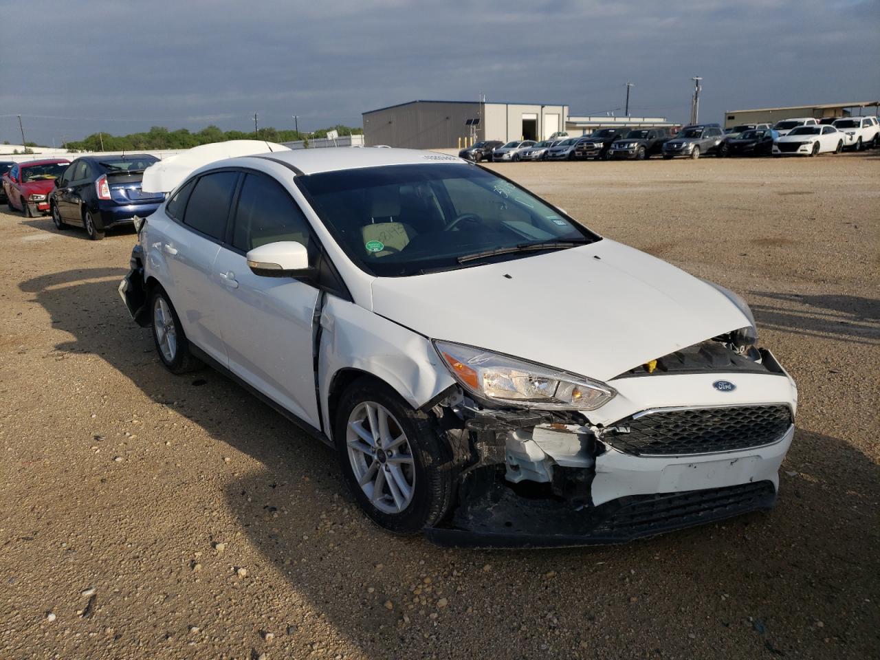 FORD FOCUS SE 2017 with VIN 1FADP3F21HL319902 - Photo from auction