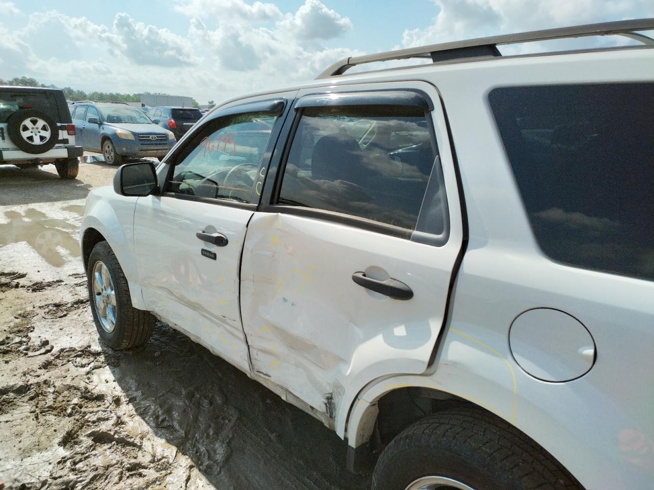 Photo 9 from auction – 2009 FORD ESCAPE XLT with VIN 1FMCU03G59KB13112