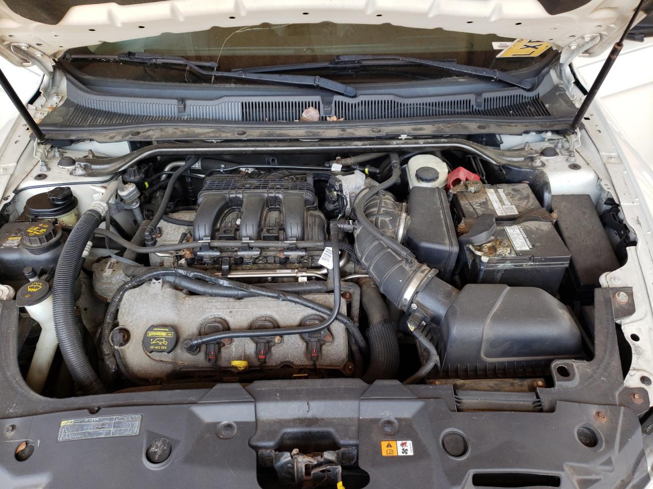 Photo 7 from auction – 2012 FORD TAURUS SE with VIN 1FAHP2DW9CG105517