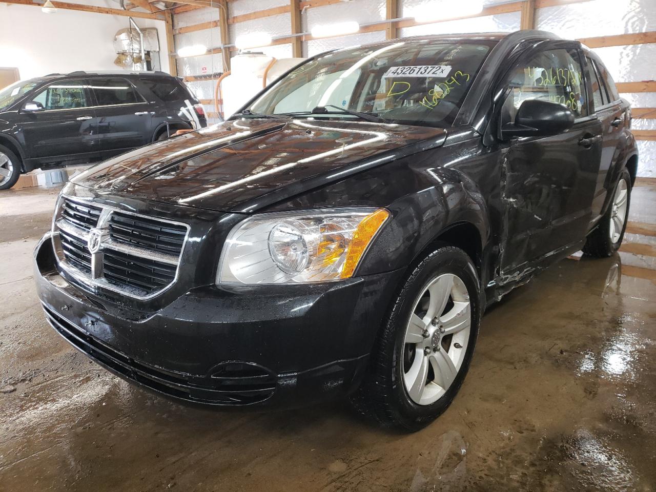 Photo 2 from auction – 2011 DODGE CALIBER MA with VIN 1B3CB3HA4BD168243