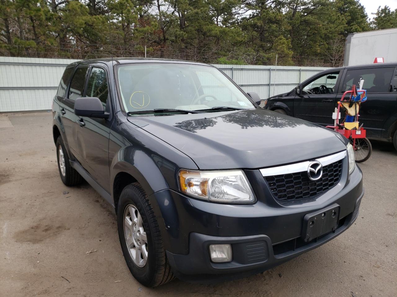 MAZDA TRIBUTE I 2010 with VIN 4F2CY0C70AKM05585 - Photo from auction