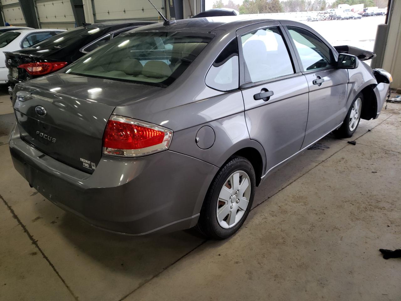 Photo 4 from auction – 2009 FORD FOCUS S with VIN 1FAHP34N99W118344