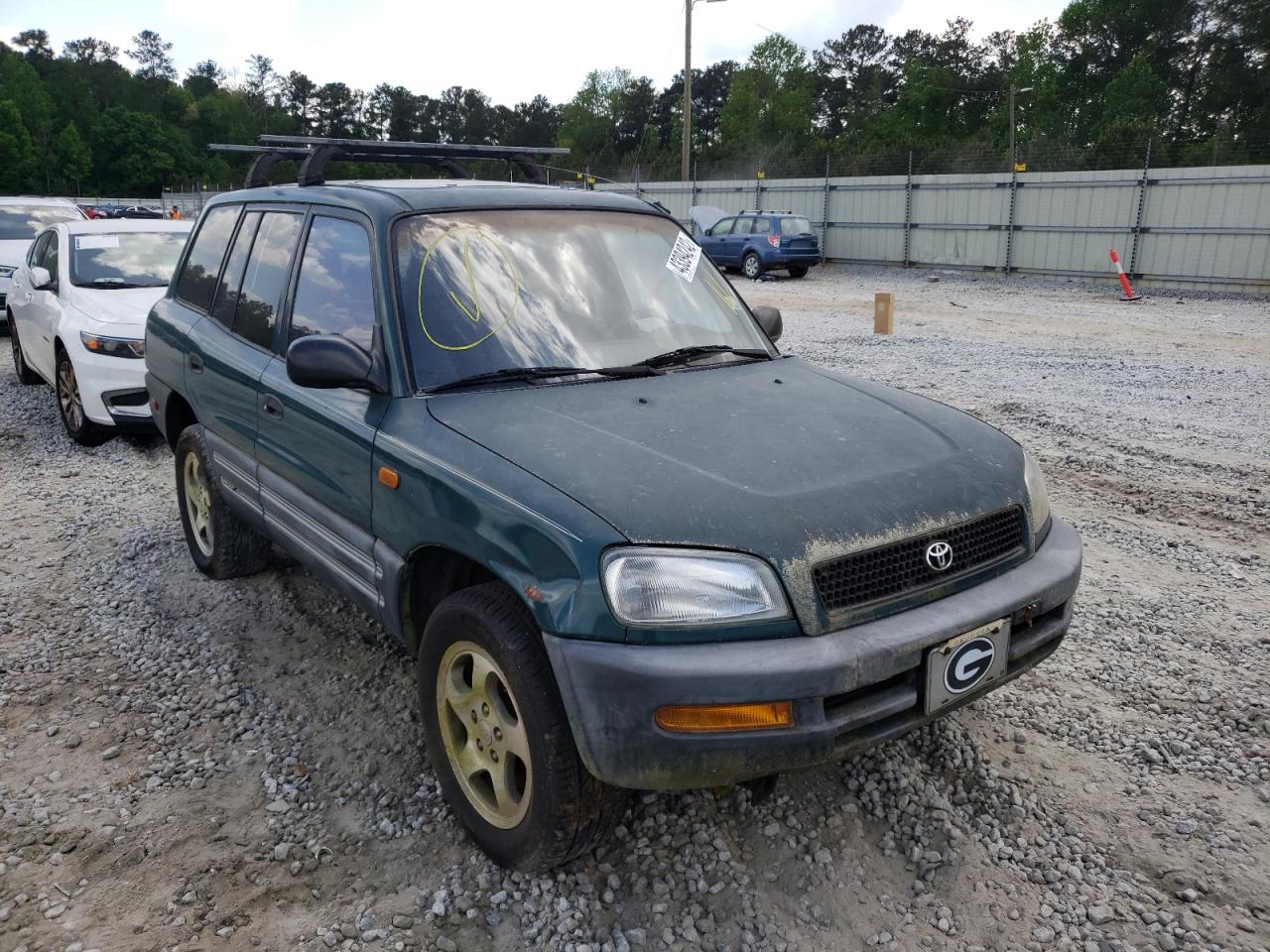 TOYOTA RAV4 1997 with VIN JT3GP10V2V0009449 - Photo from auction