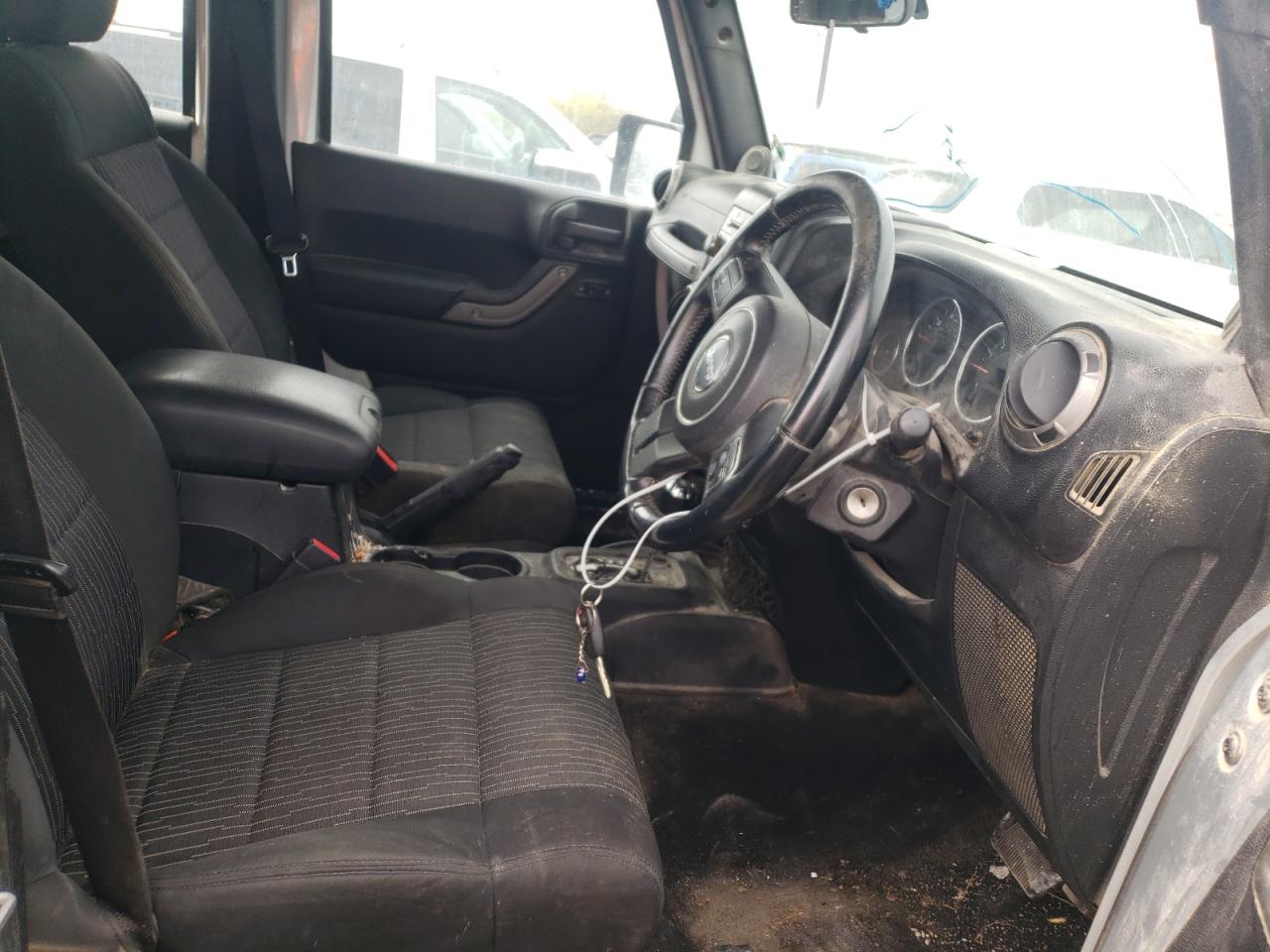 Photo 5 from auction – 2011 JEEP WRANGLER U with VIN 1J4BZ3H12BL568260