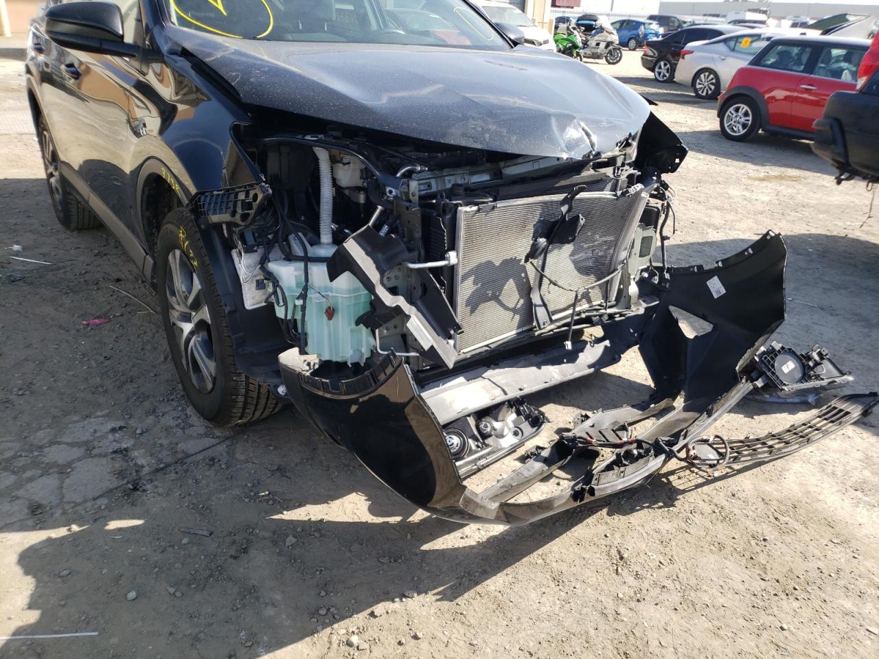 Photo 9 from auction – 2018 TOYOTA RAV4 LE with VIN 2T3ZFREV9JW519513