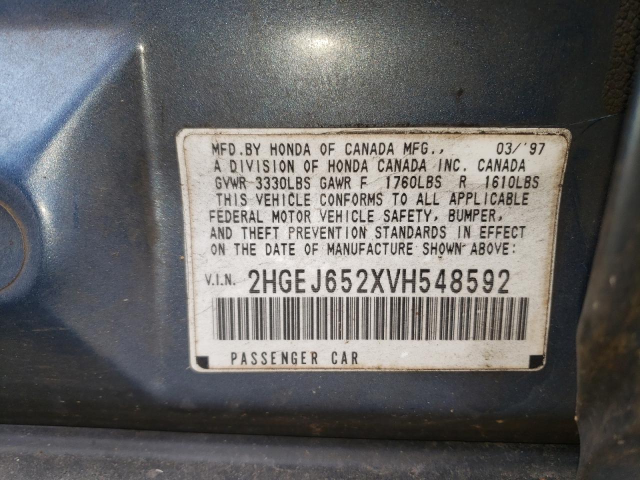 Photo 10 from auction – 1997 HONDA CIVIC DX with VIN 2HGEJ652XVH548592