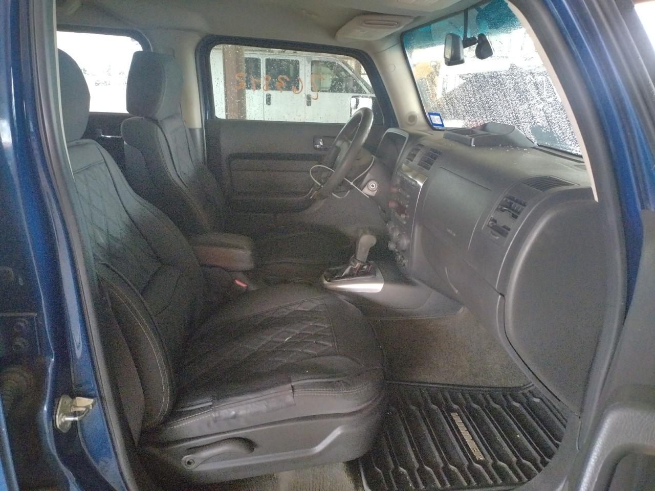 Photo 5 from auction – 2006 HUMMER H3 with VIN 5GTDN136568181558