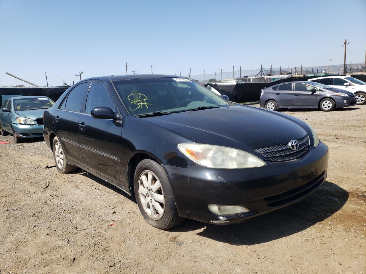 TOYOTA CAMRY LE 2004 with VIN 4T1BE30K84U338480 - Photo from auction