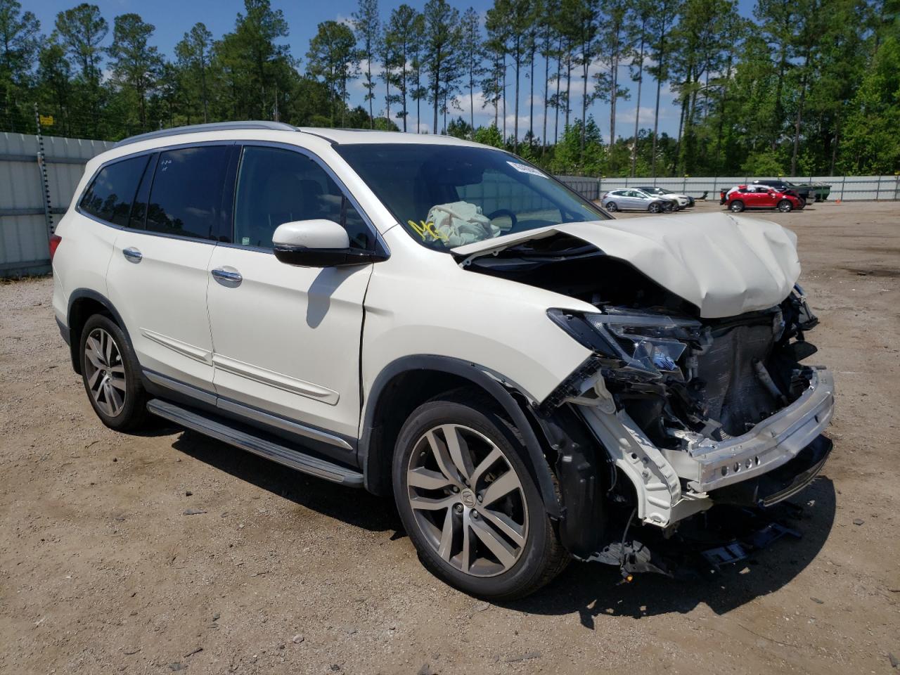 HONDA PILOT ELIT 2016 with VIN 5FNYF6H01GB116327 - Photo from auction