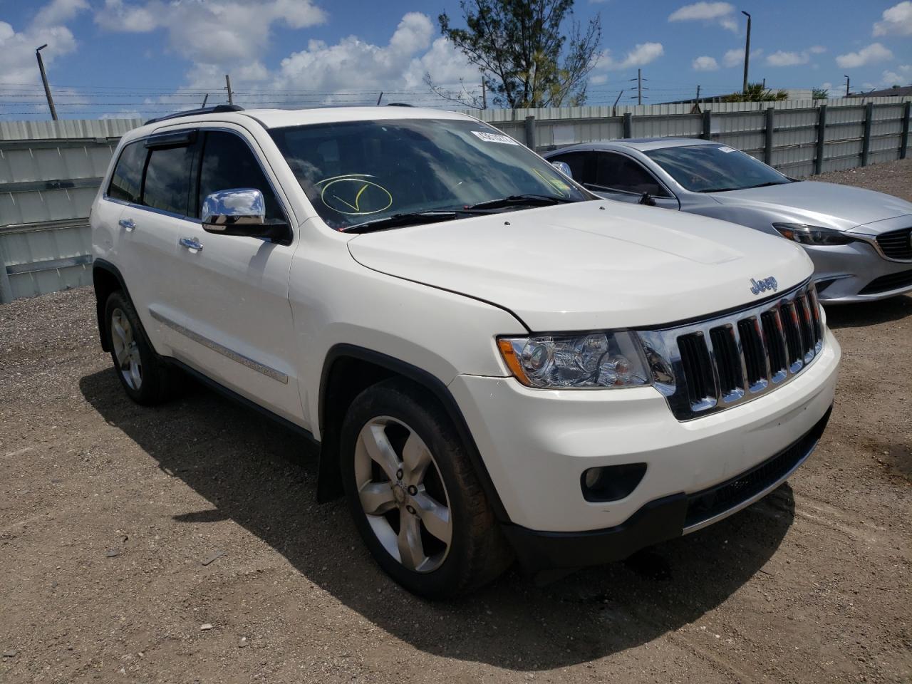 JEEP GRAND CHER 2011 with VIN 1J4RR5GT0BC603567 - Photo from auction