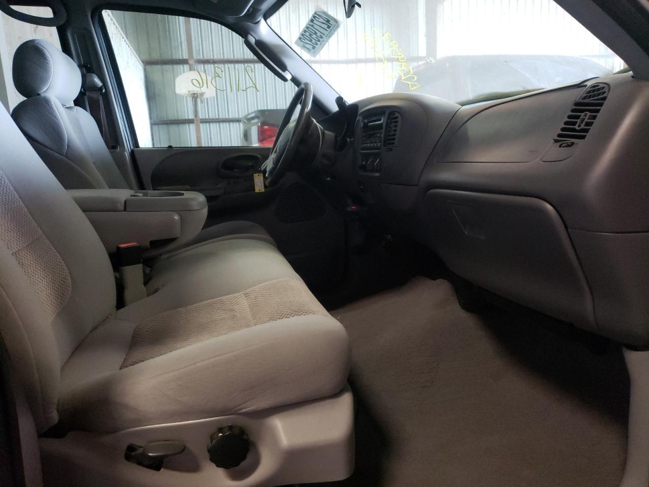 Photo 5 from auction – 2003 FORD F150 SUPER with VIN 1FTRW07653KA85703