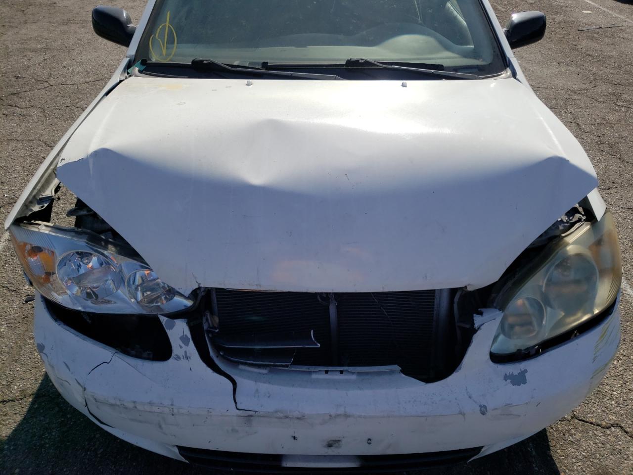Photo 7 from auction – 2003 TOYOTA COROLLA CE with VIN 1NXBR32E23Z015214