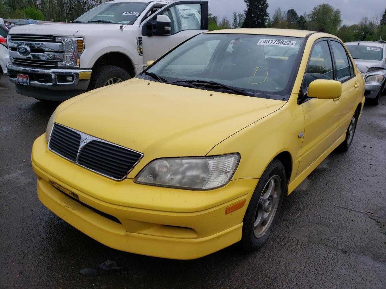 Photo 2 from auction – 2002 MITSUBISHI LANCER OZ with VIN JA3AJ86E22U040237